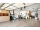 Spacious garage with ample storage cabinets and room for multiple vehicles and equipment at 2307 W Sienna Bouquet Pl, Phoenix, AZ 85085