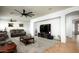 This modern living room features neutral tones and ample space at 2307 W Sienna Bouquet Pl, Phoenix, AZ 85085