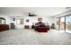 Spacious main bedroom suite with sitting area and private balcony access at 2307 W Sienna Bouquet Pl, Phoenix, AZ 85085