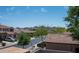 Balcony view of a quiet neighborhood with mountain views in the distance at 2307 W Sienna Bouquet Pl, Phoenix, AZ 85085