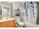 Bathroom featuring tub, shower, and vanity with a vessel sink at 2727 S 160Th Ln, Goodyear, AZ 85338