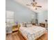 Bedroom with ceiling fan, window with blinds, and neutral colors at 2727 S 160Th Ln, Goodyear, AZ 85338