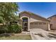 Charming single-story home featuring a well-maintained front yard and two-car garage at 2727 S 160Th Ln, Goodyear, AZ 85338