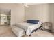 Serene bedroom with a spacious layout, neutral tones, and a large closet with mirrored doors at 2834 S Extension Rd # 2001, Mesa, AZ 85210