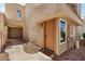 Welcoming condo exterior with a charming entryway featuring a cozy front door and well maintained landscaping at 2834 S Extension Rd # 2001, Mesa, AZ 85210
