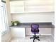 This home office includes a built in desk with shelving, perfect for remote work or study at 2834 S Extension Rd # 2001, Mesa, AZ 85210