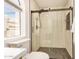 Contemporary bathroom featuring a frameless glass shower with a modern shower head and elegant tile design at 2834 S Extension Rd # 2001, Mesa, AZ 85210
