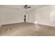 Large bedroom with neutral carpet and natural light at 30003 W Rockmount Ave, Buckeye, AZ 85396
