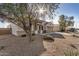 Well-maintained single-story home with desert landscaping and a welcoming front entrance at 30003 W Rockmount Ave, Buckeye, AZ 85396