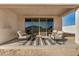 Outdoor patio with comfortable seating at 30003 W Rockmount Ave, Buckeye, AZ 85396