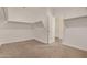 Walk-in closet with neutral paint, plush carpeting, and simple open shelving at 30003 W Rockmount Ave, Buckeye, AZ 85396