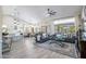 Inviting living room with abundant natural light and open concept connects kitchen and dining, perfect for gatherings at 3070 N 148Th Dr, Goodyear, AZ 85395