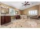 Luxurious bathroom with dual vanities, a soaking tub, and tile flooring at 3203 E Ellis St, Mesa, AZ 85213