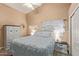 Cozy bedroom with matching wardrobe and nightstands and a neutral color palette at 3203 E Ellis St, Mesa, AZ 85213