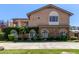 Attractive two-story home featuring stone accents, arched windows, and an inviting balcony at 3203 E Ellis St, Mesa, AZ 85213