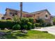 A stunning home featuring manicured lawns and shrubs surrounding its perimeter at 3203 E Ellis St, Mesa, AZ 85213