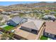 Private backyard includes an outdoor kitchen, hot tub, and mountain views at 3366 E Constance Way, Phoenix, AZ 85042