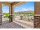 Charming front porch with stone columns and mountain views at 3366 E Constance Way, Phoenix, AZ 85042