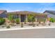 Inviting single-story home with manicured desert landscaping and a two-car garage at 3366 E Constance Way, Phoenix, AZ 85042