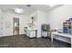 Spacious laundry room with modern washer/dryer, ample counter space, and functional storage solutions at 3366 E Constance Way, Phoenix, AZ 85042