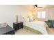 Cozy bedroom with modern decor, soft lighting, and a comfortable armchair at 3522 E Cherokee St, Phoenix, AZ 85044