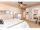 Well-lit bedroom featuring stylish decor and a ceiling fan at 3522 E Cherokee St, Phoenix, AZ 85044