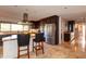 Open kitchen with granite countertops, stainless steel appliances, and a breakfast bar at 3522 E Cherokee St, Phoenix, AZ 85044