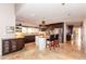 Spacious kitchen featuring custom cabinets, granite countertops, a center island, and stainless steel appliances at 3522 E Cherokee St, Phoenix, AZ 85044