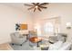 Bright living room featuring high ceilings, large windows, and contemporary furnishings at 3522 E Cherokee St, Phoenix, AZ 85044