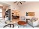 Spacious living room offering views to the dining area and featuring a soaring ceiling at 3522 E Cherokee St, Phoenix, AZ 85044