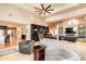 Spacious living room with modern furnishings, high ceilings, fan, and ample natural light at 3522 E Cherokee St, Phoenix, AZ 85044