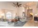 Living room features a soaring ceiling, lots of windows and views into the bedroom and entry at 3522 E Cherokee St, Phoenix, AZ 85044
