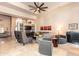 Elegant living room featuring high ceilings, modern furnishings, and large windows, creating a welcoming space at 3522 E Cherokee St, Phoenix, AZ 85044