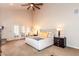 Serene main bedroom with a neutral color scheme, plush carpet, and access to the outdoors at 3522 E Cherokee St, Phoenix, AZ 85044