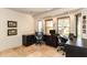 Spacious home office with large windows offering outdoor views and built in desk at 3522 E Cherokee St, Phoenix, AZ 85044