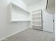 Spacious walk-in closet with carpet flooring and built-in shelving and hanging rods at 3780 E Rakestraw Ln, Gilbert, AZ 85298