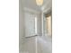 Inviting foyer featuring a white front door, tile flooring, and neutral walls, creating a welcoming entrance at 3780 E Rakestraw Ln, Gilbert, AZ 85298