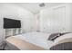 This bedroom offers a TV and closet at 44837 W Horse Mesa Rd, Maricopa, AZ 85139