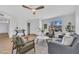 Comfortable living room featuring modern furniture, stylish decor, and abundant natural light at 5008 W New World Dr, Glendale, AZ 85302