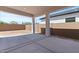 Covered back patio area offers an excellent space for outdoor entertaining at 537 E Aurora Dr, San Tan Valley, AZ 85140