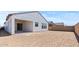 New home features a spacious backyard ready for personalization and landscaping at 537 E Aurora Dr, San Tan Valley, AZ 85140