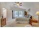 Spacious main bedroom features large windows and ensuite bathroom access, providing natural light at 616 E Sheffield Ave, Gilbert, AZ 85296
