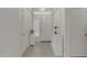 Bright entryway with tile floors, white cabinets, and stylish decor, offering a welcoming entrance at 616 E Sheffield Ave, Gilbert, AZ 85296