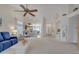 Expansive living room with high ceilings, seamless flow to dining, and ample space for relaxing and entertaining at 616 E Sheffield Ave, Gilbert, AZ 85296