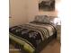 Serene bedroom showcasing a decorative comforter, soft lighting, and a peaceful ambiance for restful nights at 6191 S Pearl Dr, Chandler, AZ 85249