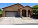 Charming single-story home with a well-manicured front yard and two car garage at 6191 S Pearl Dr, Chandler, AZ 85249