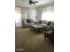 Cozy living room with neutral decor, comfortable seating, and plenty of natural light at 6191 S Pearl Dr, Chandler, AZ 85249