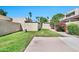 Private backyard featuring green grass and beautiful landscaping, offering a serene outdoor retreat at 6226 N 21St Dr, Phoenix, AZ 85015
