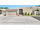 Beige single-story home showcasing a front yard, garage, and secure front door at 6226 N 21St Dr, Phoenix, AZ 85015