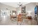 Contemporary living room featuring tile floors, art, and comfortable furniture at 6226 N 21St Dr, Phoenix, AZ 85015